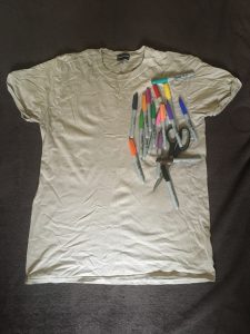 t-shirt, pens and scissors. All equipment needed for the activity 