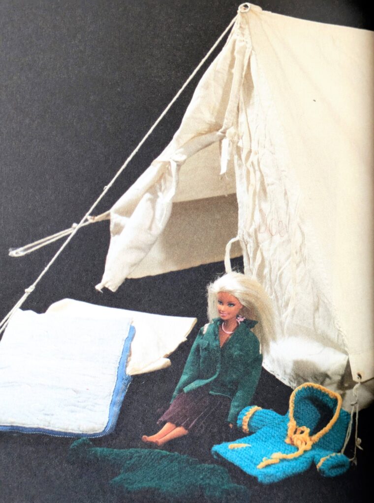 A model tent and camp kit complete with mini Woodcraft Folk Shirt, to explain tent erection and Wapenshaw. Made by Group Leader Joan 'Oakapple Pover', 1974