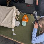 Photographing a model tent