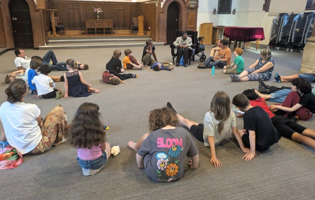 Elfins listen to Mrs. McGhie-Belgrave's Windrush story and discusses racism